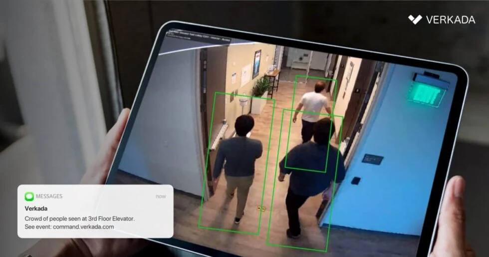 Camera system example shown by First Call with a video view and activity notification on a tablet